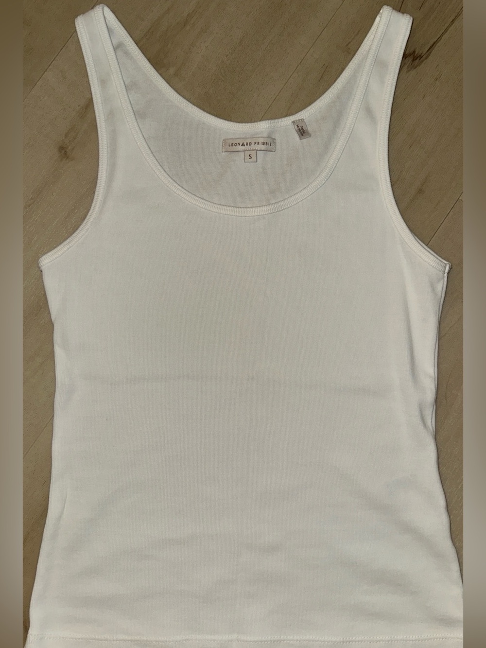 Leonard Frisbie White Tank